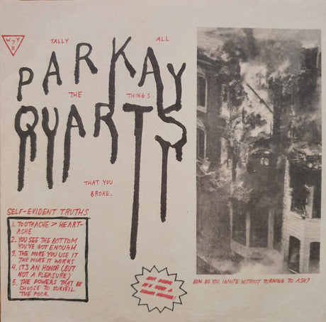 Album cover with stylized text and a black and white photo of a building.