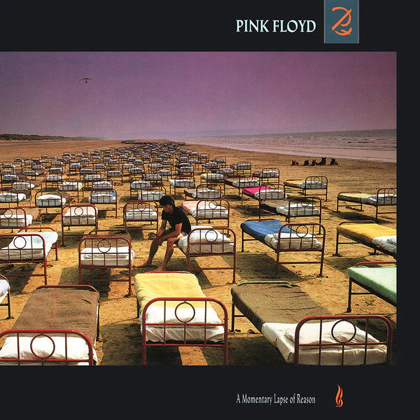 Album cover with a person sitting on a bed in an orderly arrangement of beds on a beach, featuring the Pink Floyd logo.