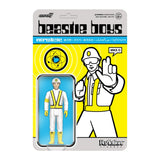 Beastie Boys 'Intergalactic' Mike D ReAction figure in its original retro-style blister packaging, featuring a yellow and gray cardback with a clear plastic bubble containing the white and yellow astronaut figure.