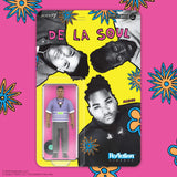 De La Soul action figure packaging with colorful floral designs on a pink background
