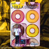 Packaged toy figure of J Dilla with donut-themed packaging