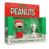Peanuts Christmas-themed packaging with two figures inside