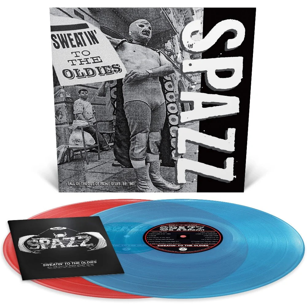 Vinyl records with a Spazz album cover featuring black and white imagery.