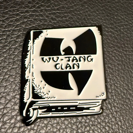 Wu-Tang Clan logo on a black leather background
