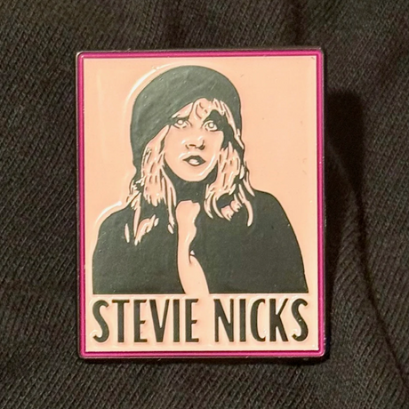 Stevie Nicks pin with a stylized illustration on a textured surface