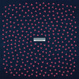 Navy blue background with pink heart pattern and a brand logo in the center.