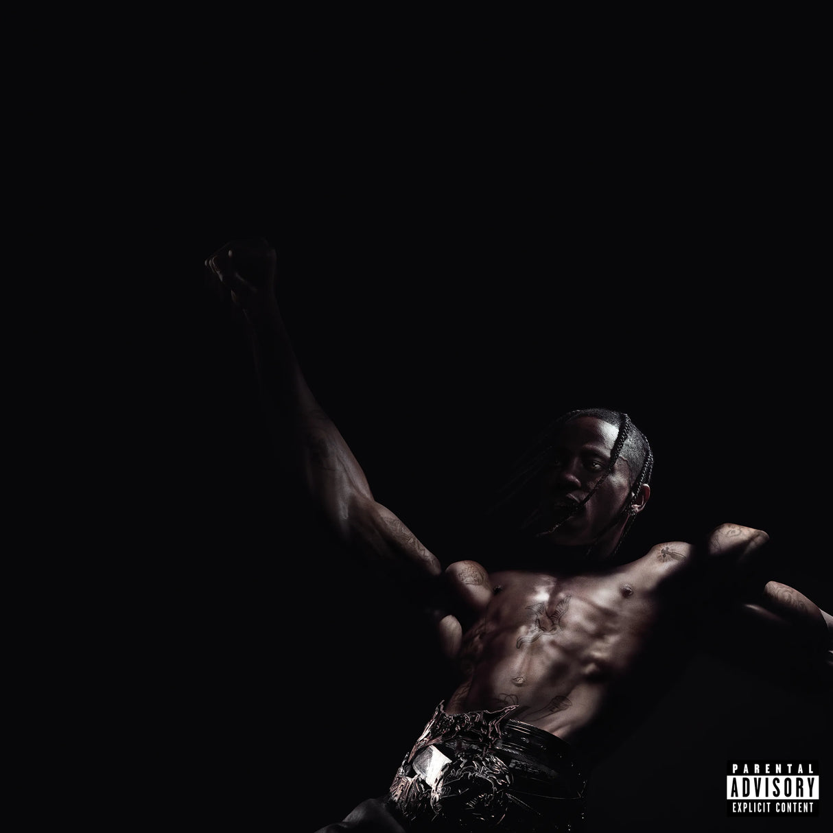 Black and white album cover with a person in a dynamic pose against a dark background