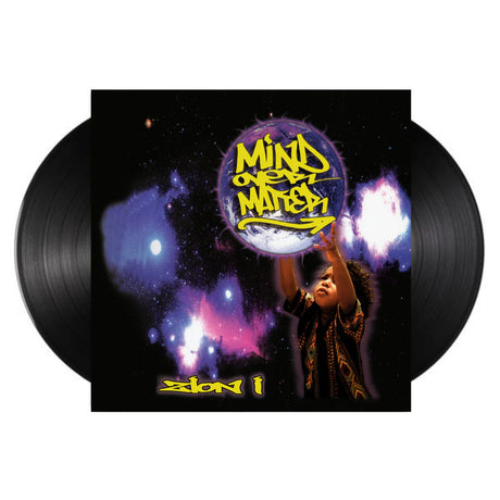 Vinyl records with a cover featuring a person holding a moon and the text 'Mind Over Matter' on a cosmic background.