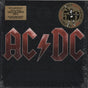AC/DC album cover with gold-colored text on a dark background