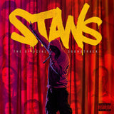 Album cover with a person holding a microphone against a red curtain background, featuring the title 'STANS' and 'The Official Soundtrack'.
