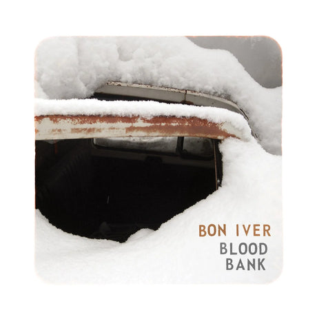 Album cover of 'Blood Bank' by Bon Iver with a snowy scene.