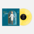 Vinyl record with blue cover featuring Dolly Parton and yellow disc.