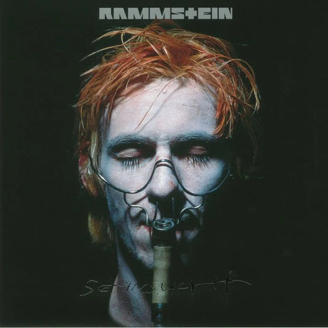 Album cover with a person wearing a gas mask and Rammstein logo.