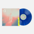 Blue vinyl record with a colorful cover on a white background
