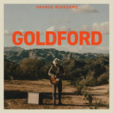 Album cover with a person playing guitar in a scenic landscape, featuring the text 'Orange Blossoms Goldford'.