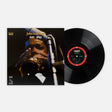 Vinyl record and cover of John Coltrane's 'Sun Ship' on a white background