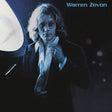 Album cover for Warren Zevon, featuring a blue-toned portrait of a person with glasses and a dark jacket against a dark background, with the text 'Warren Zevon' in the top right.