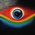 Album cover with a colorful eye design