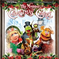 Poster for 'The Muppet Christmas Carol' featuring Muppets around a Christmas tree.