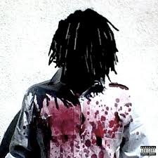 Person wearing a shirt with a colorful abstract design on a white background