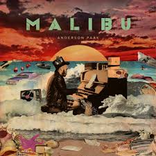 Album cover with a person playing a piano on a beach at sunset, featuring the word 'Malibu' and 'Anderson .Paak'.