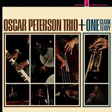 Album cover of Oscar Peterson Trio featuring close-up images of musicians with instruments.