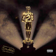 Gold statue with number '2' on a dark background, featuring a parental advisory label.