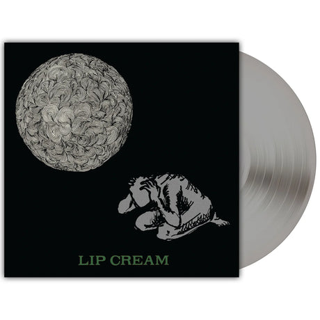 Vinyl record with a black cover featuring artistic designs and 'Lip Cream' text.