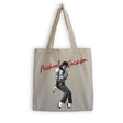 A beige canvas tote bag with long handles, featuring a black and white graphic of Michael Jackson and his name in red script across the front, shown against a plain white background.