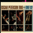 Album cover of Oscar Peterson Trio featuring close-up shots of musicians playing instruments.