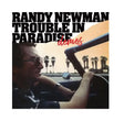 Album cover of 'Trouble in Paradise demos' by Randy Newman with a person driving a car and palm trees in the background.