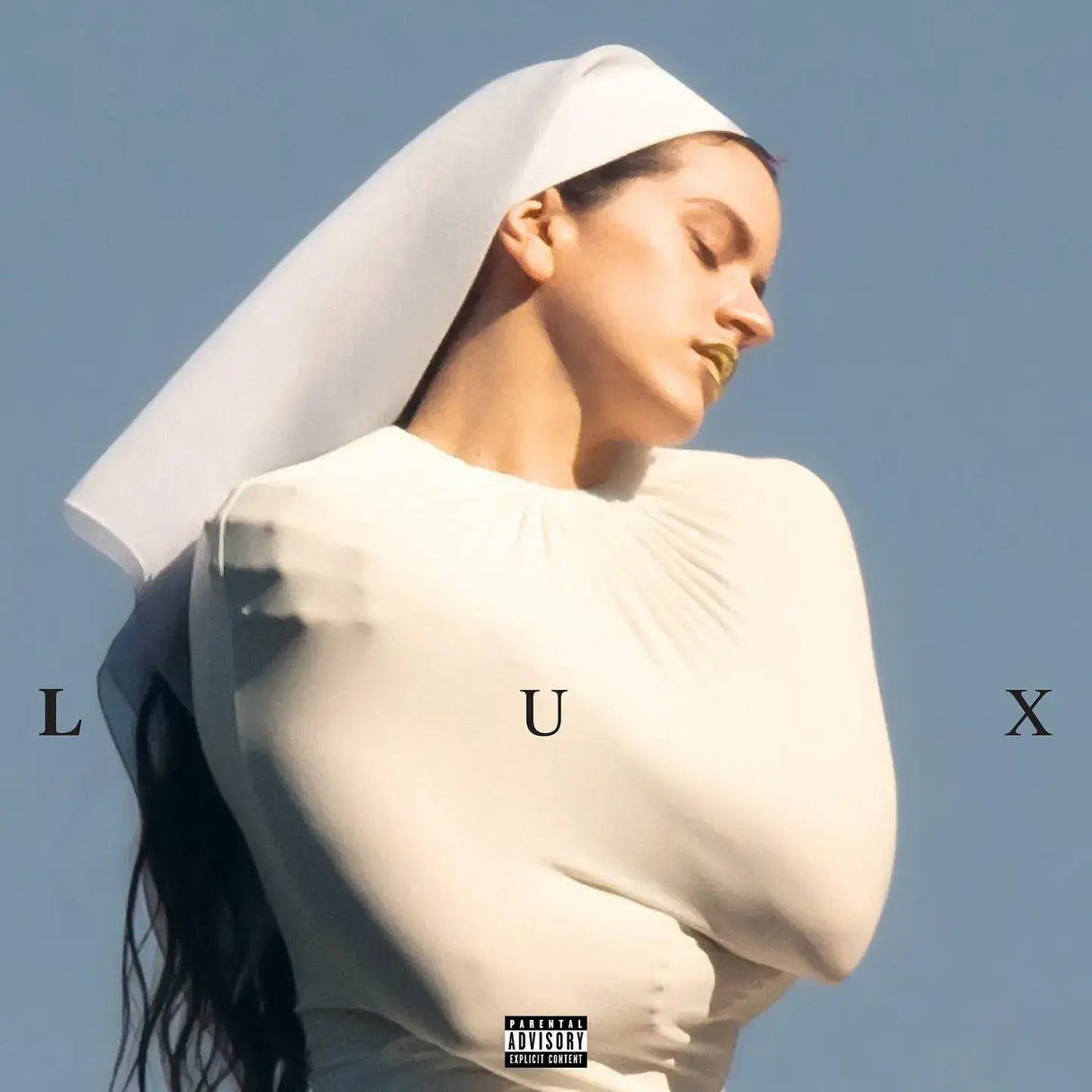 Person wearing a white outfit with a hood against a blue sky, featuring the word 'LUX'.