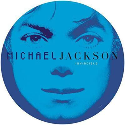 Round blue album cover with a face design and 'Michael Jackson Invincible' text.