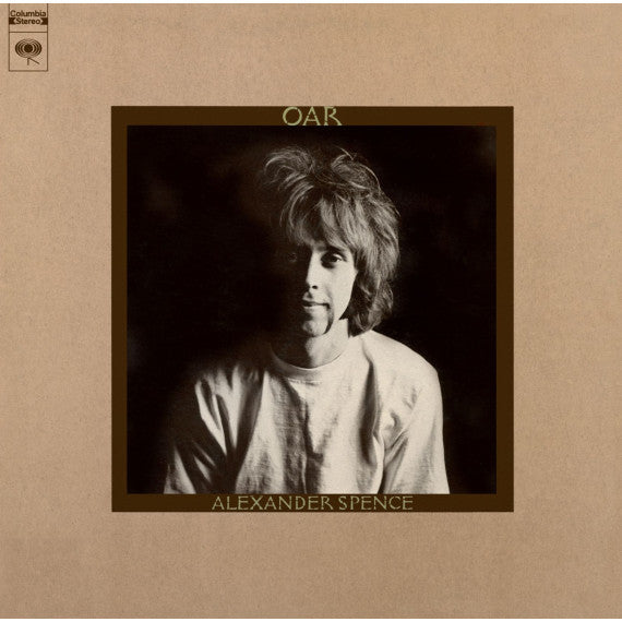 Album cover for 'Oak' by Alexander Spence, featuring a black-and-white portrait of the artist centered on a tan background with a dark brown border.