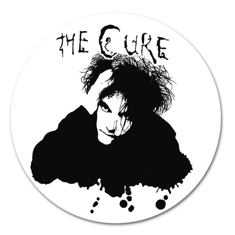 Circular sticker with a black and white illustration of a person and 'The Cure' text on a white background