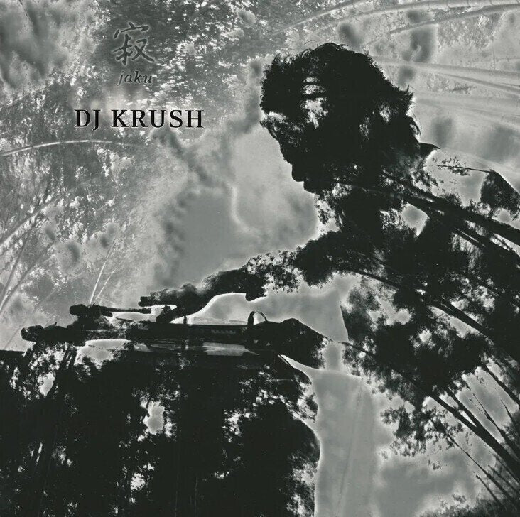 Album cover with trees and road, featuring the text 'DJ Krush' and 'Jaku'.