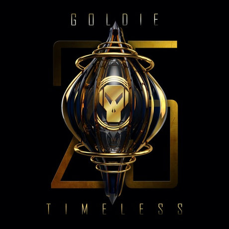 Decorative object with gold and black design on a black background, featuring the text 'Goldie' and 'Timeless'.