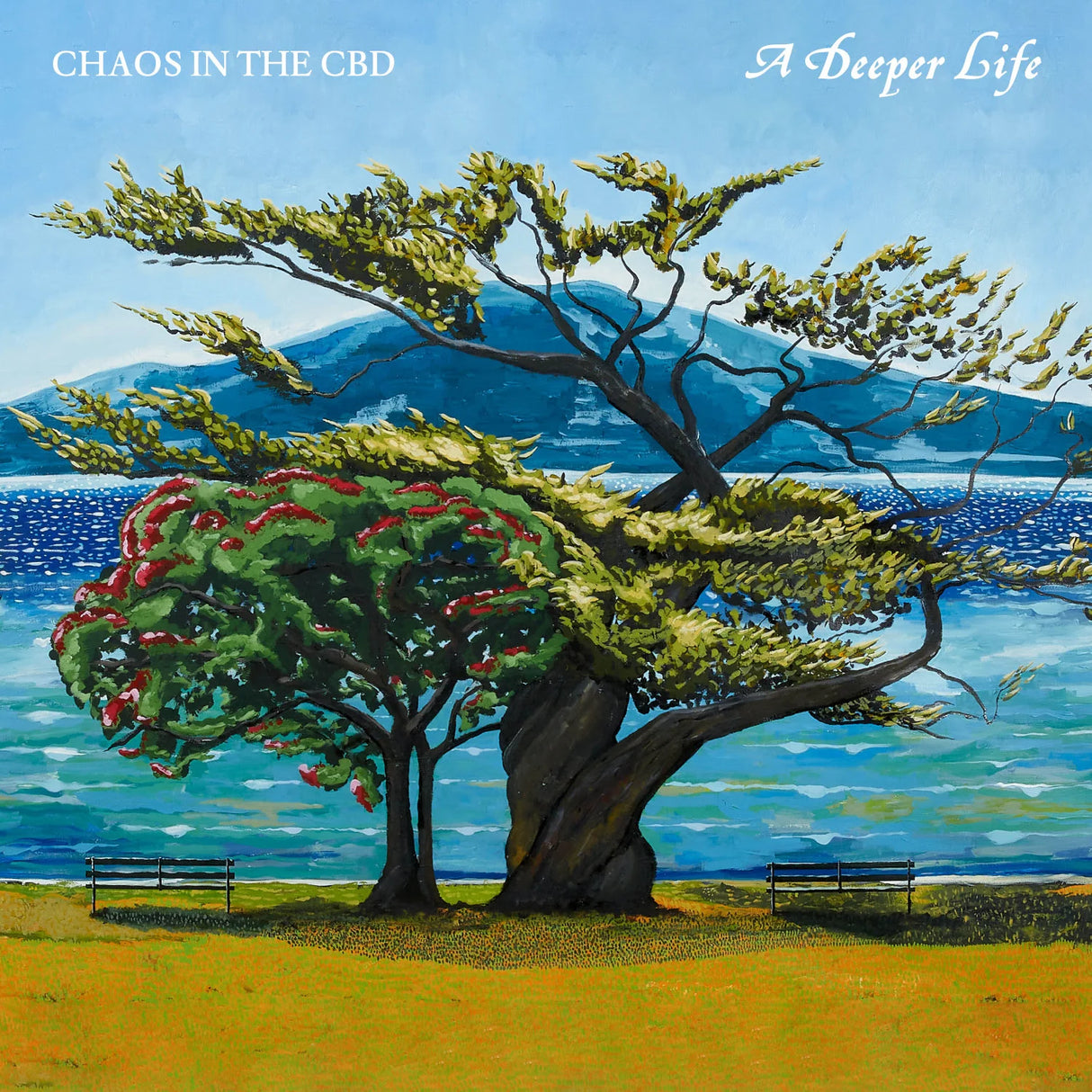 Artistic depiction of a large tree with a bench under it, set against a blue sky and mountains.