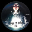 Vinyl record with a person wearing a hood and text 'king of light' and 'UR' on a dark background