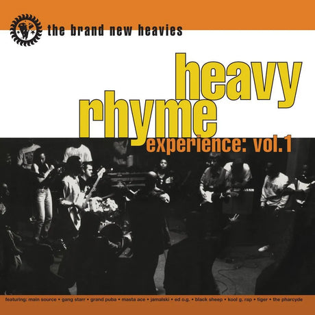 Album cover for 'Heavy Rhyme Experience: Vol. 1' by The Brand New Heavies with a band performing on stage.
