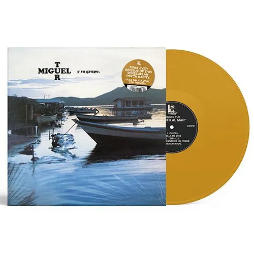 Vinyl record with a boat scene on the cover and yellow disc