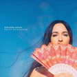 The cover art for Kacey Musgraves' album 'Golden Hour' features a woman holding a multicolored fan in front of her face with a blue sky in the background.