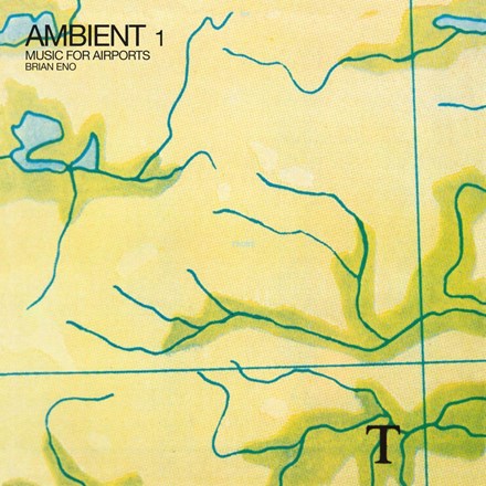 The cover of Brian Eno's album 'Ambient 1: Music For Airports' featuring a map-like pattern with green and blue lines on a yellow background, indicating a musical composition for airports.