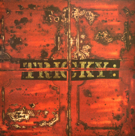 Record cover art for Tricky's 'Maxinquaye' album, featuring a close-up of a distressed, rusty metal surface with the artist's name in a bold, gritty font.