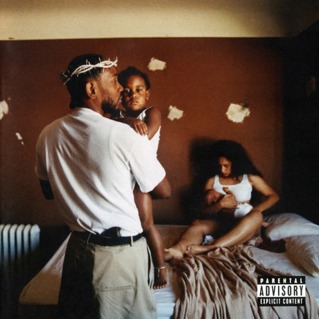 Album cover art for Kendrick Lamar's Mr. Morale & The Big Steppers featuring a man holding a young child, with a young woman sitting on a bed in the background, in a room with peeling wallpaper.