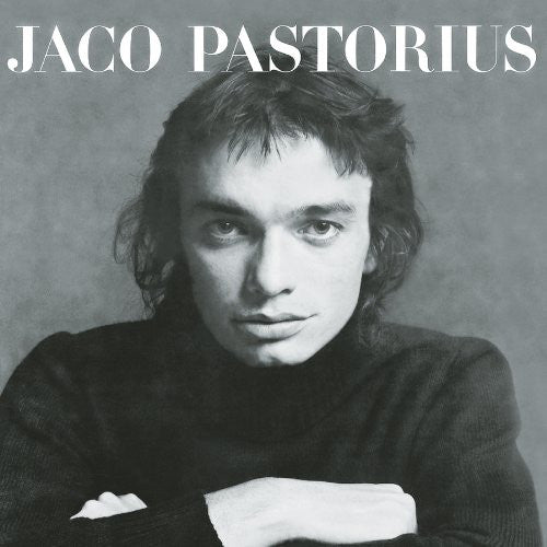 Black and white album cover featuring a portrait of Jaco Pastorious with the title 'JACO PASTORIOUS' text overlayed on the top.
